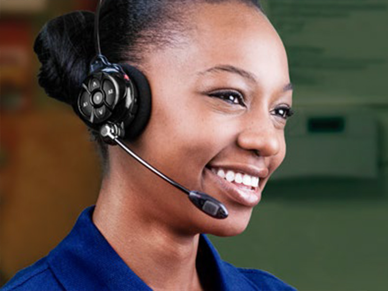 A customer service worker wearing a drive-thru headset